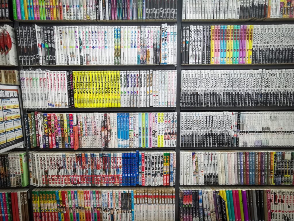 books on black wooden shelf